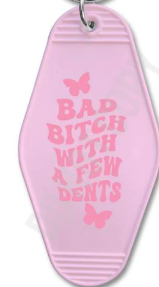 BAD B WITH A FEW DENTS KEYCHAIN